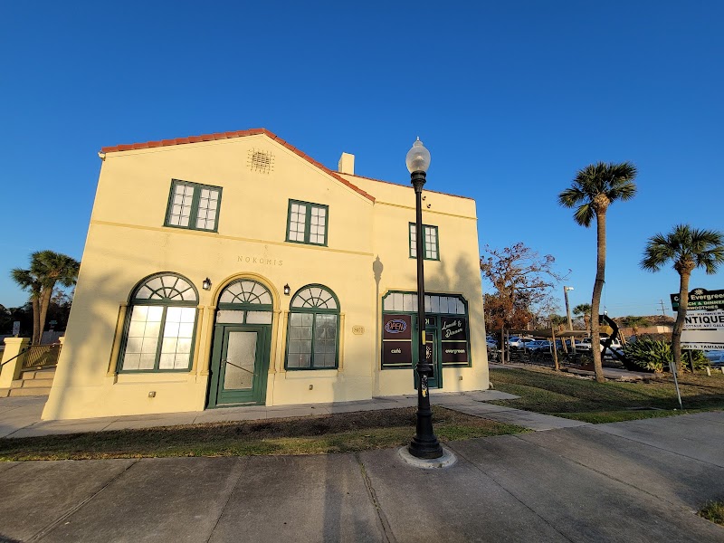 Café Evergreen Restaurant exterior at 801 South Tamiami Trail in Nokomis.