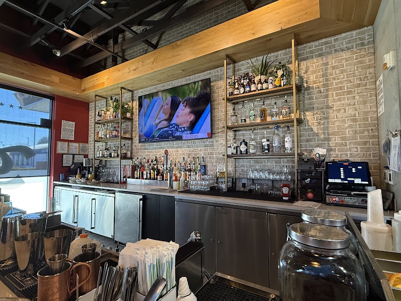 Atomic Cowboy home of Denver Biscuit Co & Fat Sully's NY Pizza