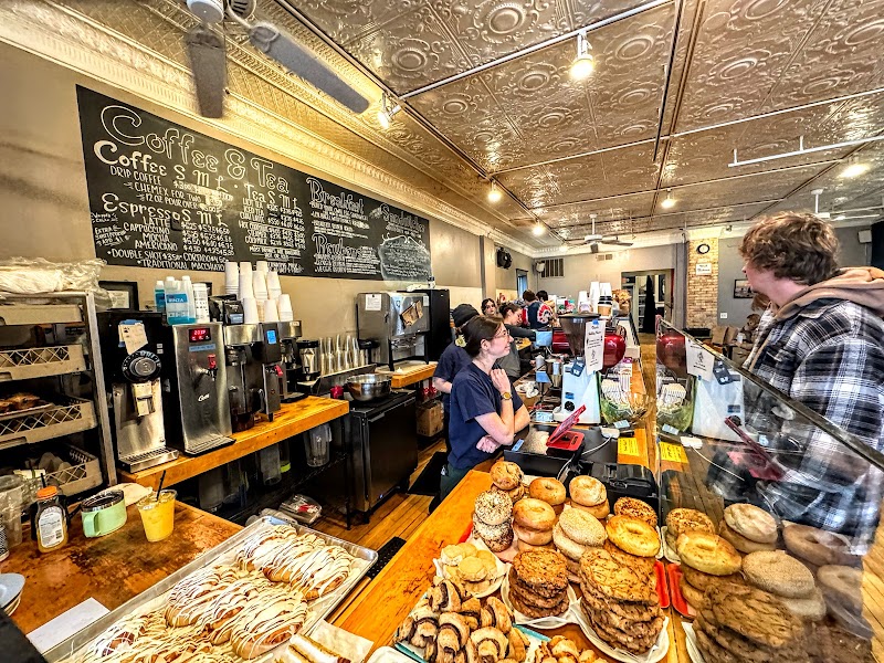 Counter, pastries, and tin ceiling inside David's Delicatessen and Coffee in New Buffalo, Michigan